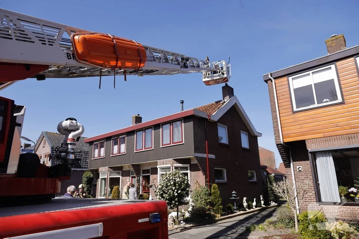 Woning vol rook bij brand in schoorsteen
