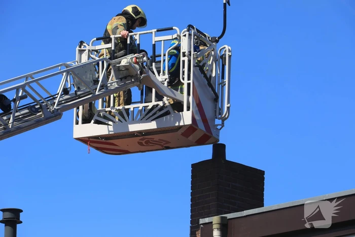 Woning vol rook bij brand in schoorsteen