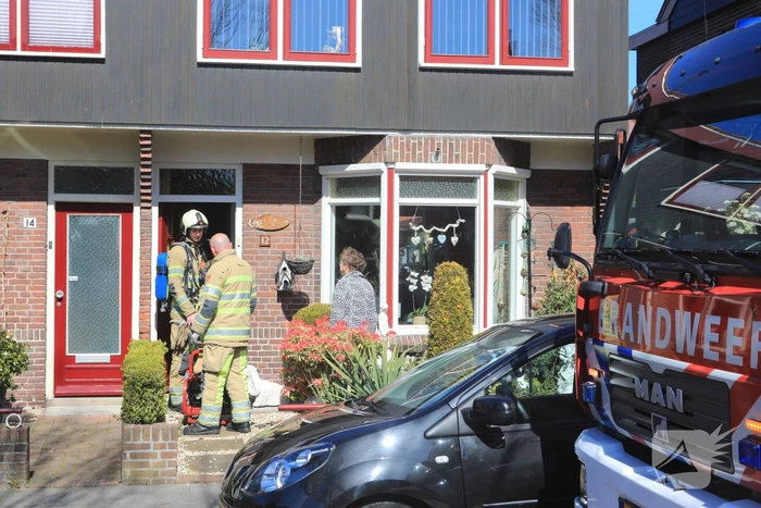 Woning vol rook bij brand in schoorsteen