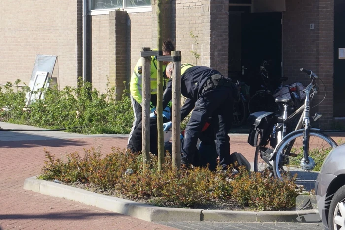 Man in boeien geslagen bij woningbrand