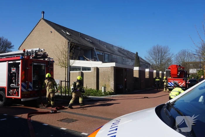 Man in boeien geslagen bij woningbrand