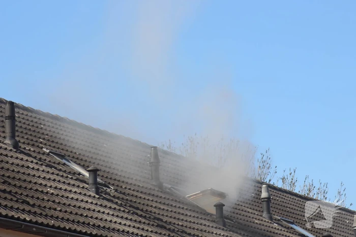 Man in boeien geslagen bij woningbrand
