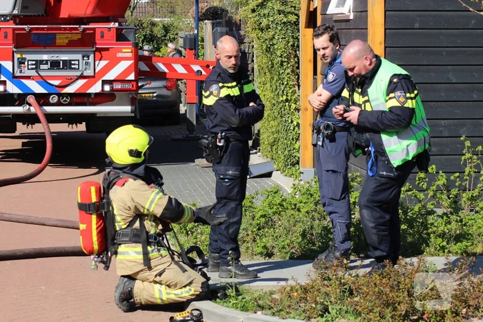 Man in boeien geslagen bij woningbrand
