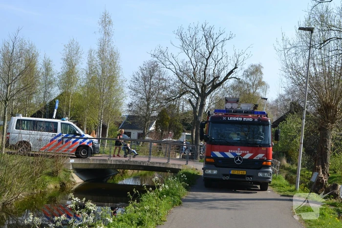 Man bekneld in leiding septictank
