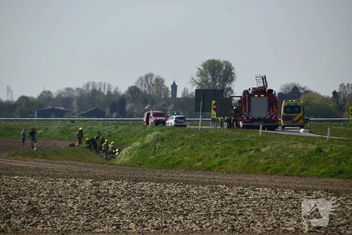 Auto te water geraakt, bestuurder overleden