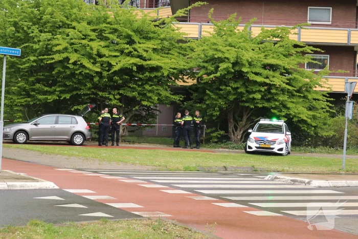 Dode aangetroffen onderaan flatgebouw