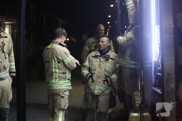 Brandweer opzoek na melding van een woningbrand