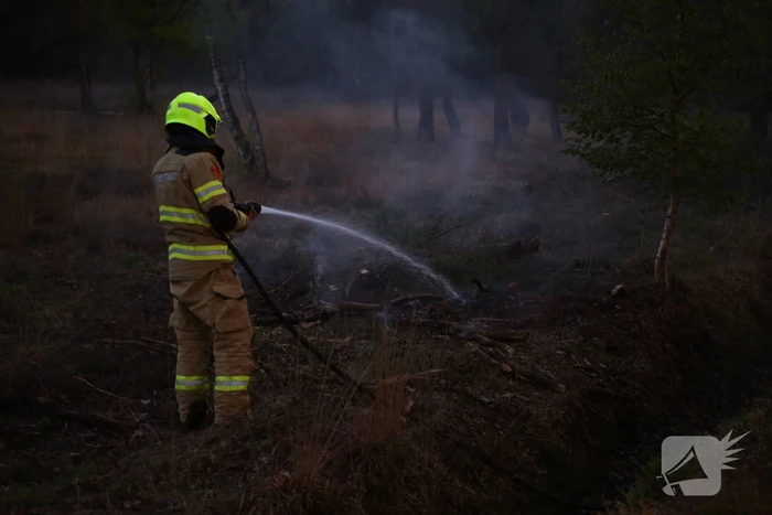 Brandweer blust buitenbrand