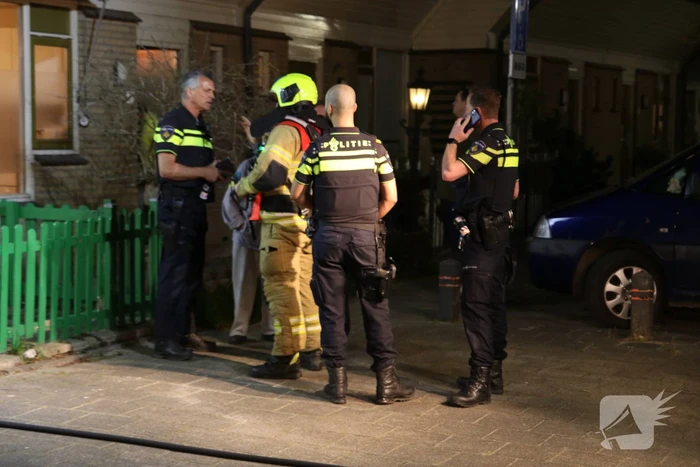 Uitslaande brand in schuur achter woning