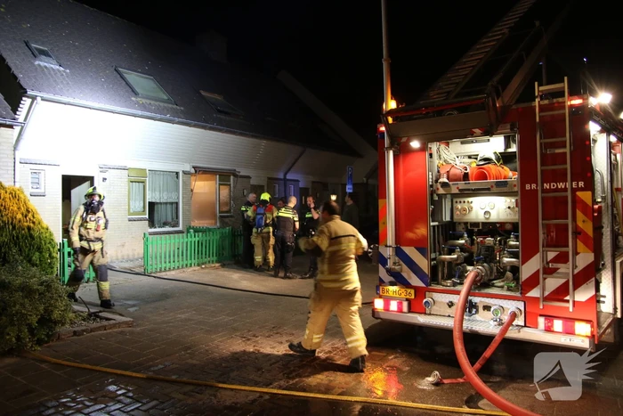 Uitslaande brand in schuur achter woning