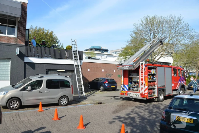 Brand op dakterras van woning