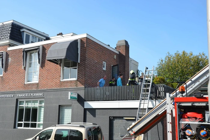 Brand op dakterras van woning