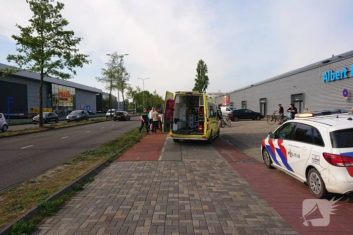 Scooter en fietser klappen op elkaar