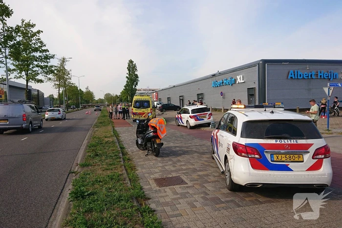 Scooter en fietser klappen op elkaar