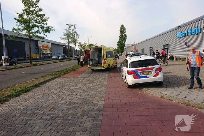 Scooter en fietser klappen op elkaar