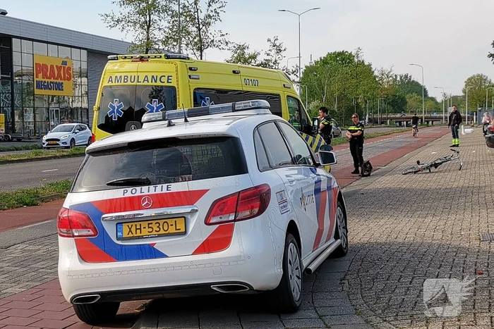 Scooter en fietser klappen op elkaar