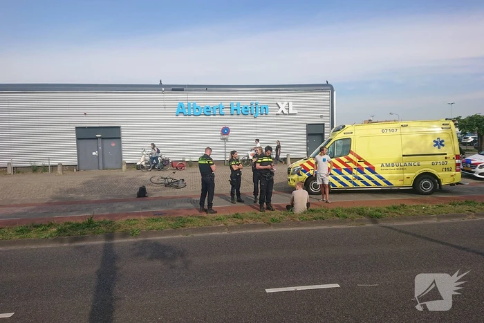 Scooter en fietser klappen op elkaar