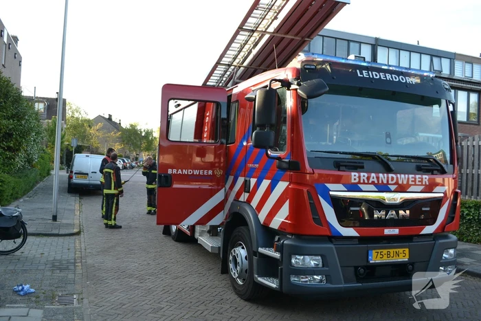 Brandweer vist sleutelbos uit ondergrondse container