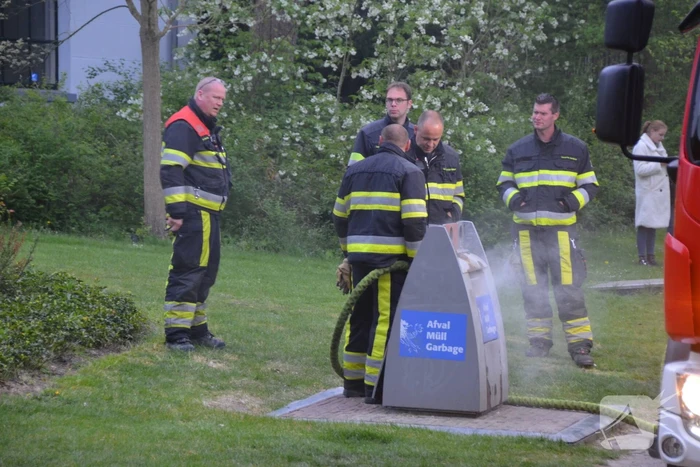 Brand in ondergrondse container