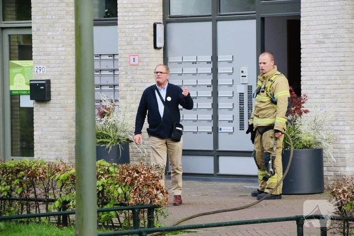 Bewoners blussen kleine keukenbrand