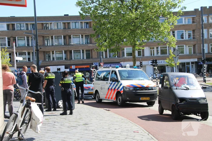 Schade na aanrijding tussen auto en scootmobiel