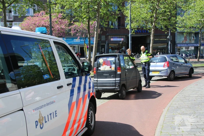 Schade na aanrijding tussen auto en scootmobiel