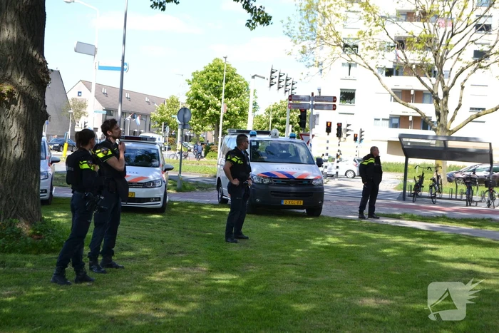 Flat omsingeld na bedreiging met vuurwapen