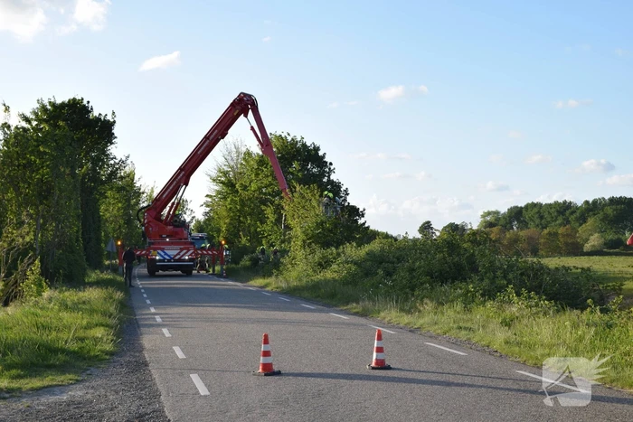 Gewonde bij auto te water