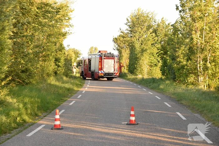 Gewonde bij auto te water