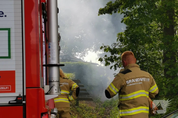 Stuk bosschage in brand