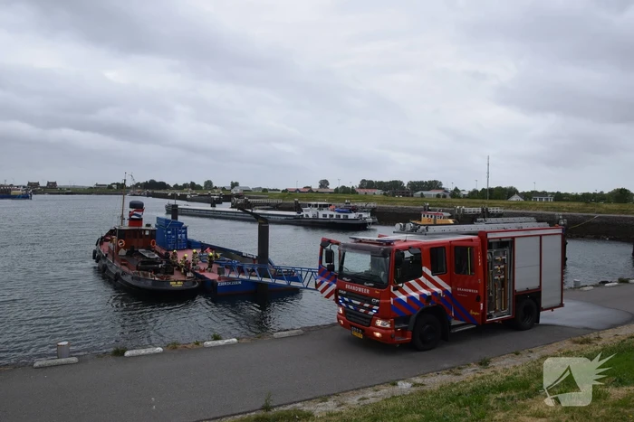 Brand in ruim van stoomsleper Dockyard III