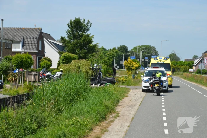 Automobilist ziet scooterrijder over het hoofd