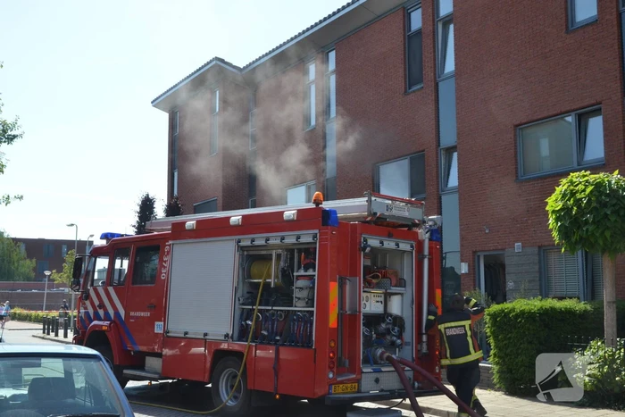 Flinke rookontwikkeling bij woningbrand