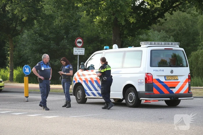 Fietser hard onderuit