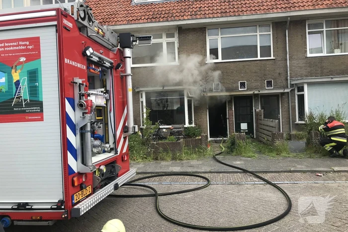 Veel rook bij brand in woning