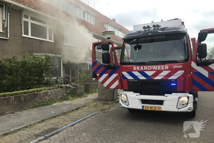 Veel rook bij brand in woning