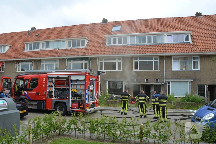 Veel rook bij brand in woning