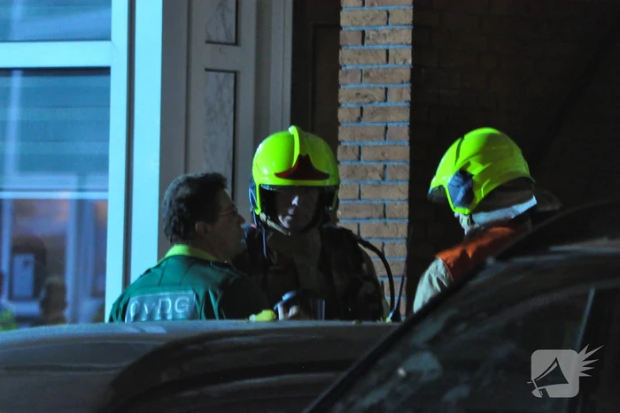 Negen personen uit brandende woning gehaald