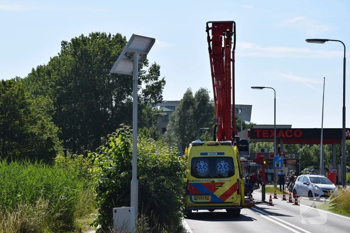 Bestuurder scootmobiel te water