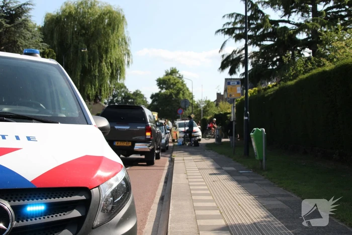 Fietsster gewond na aanrijding met auto