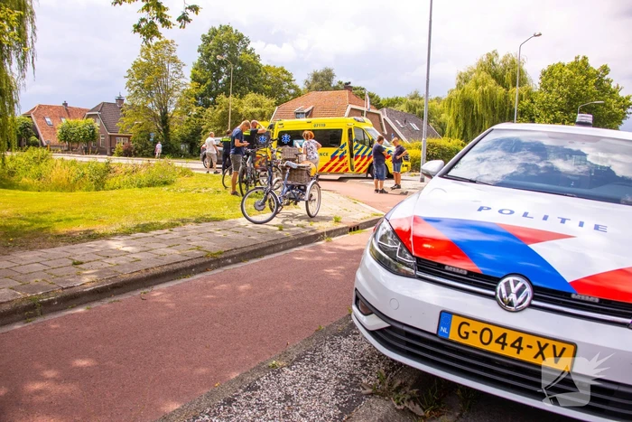 Driewieler vliegt uit de bocht