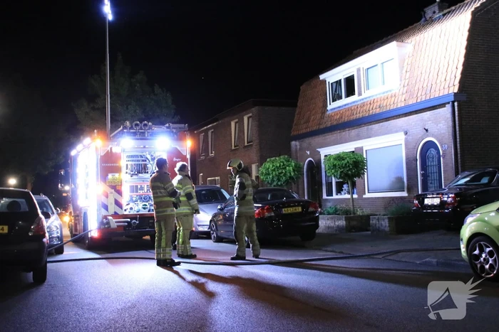 Buitenbrand achter woning