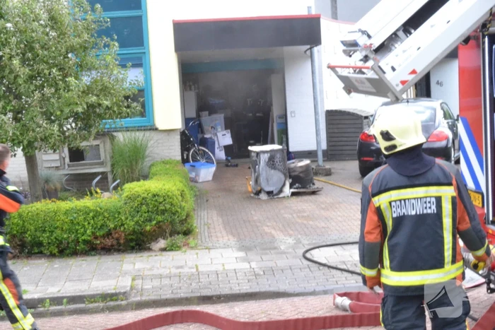 Flinke rookontwikkeling na kortsluiting in droger