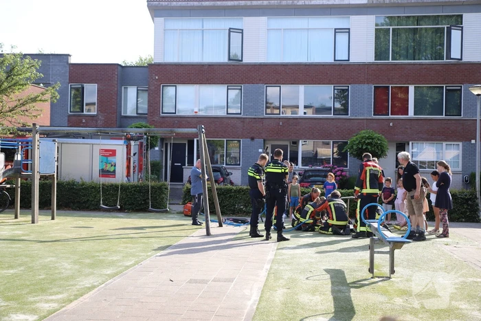 Jongen vast onder draaimolen