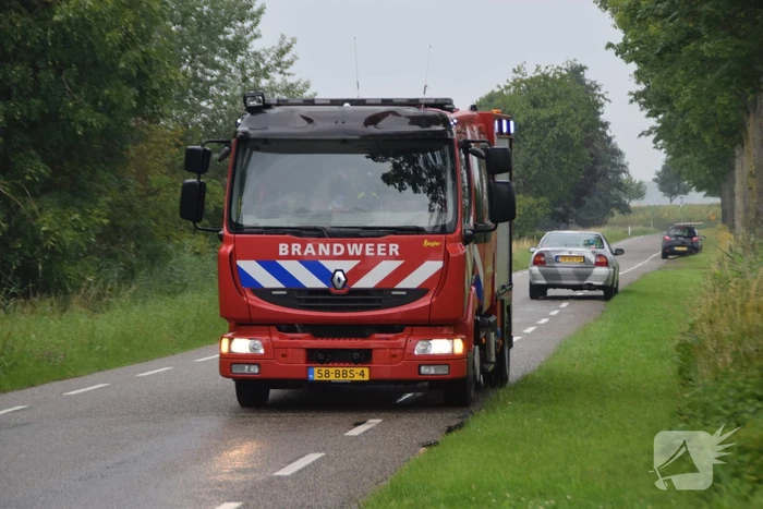 Hooibalen in schuur zorgen voor brand