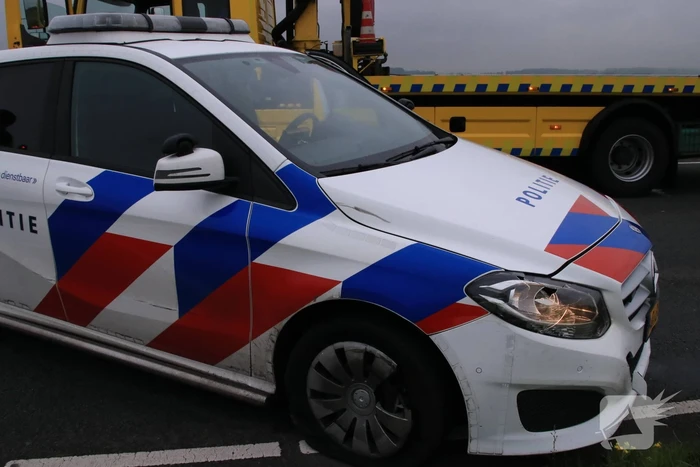 Politieauto ramt personenauto, inzittenden aangehouden