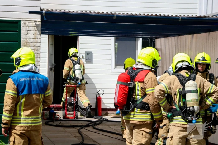 Uitslaande brand in tussenwoning