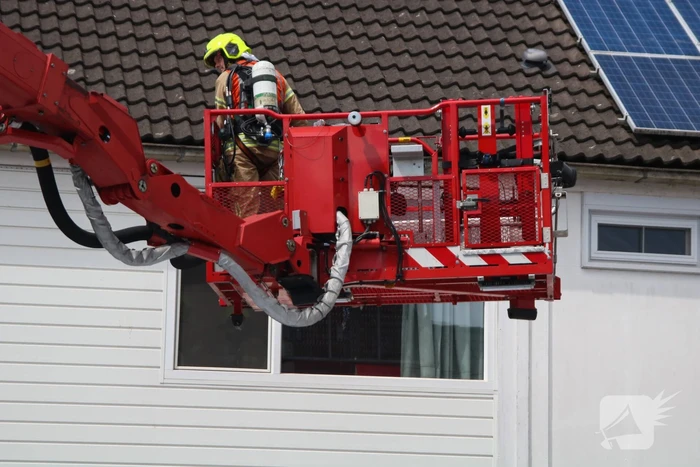 Uitslaande brand in tussenwoning