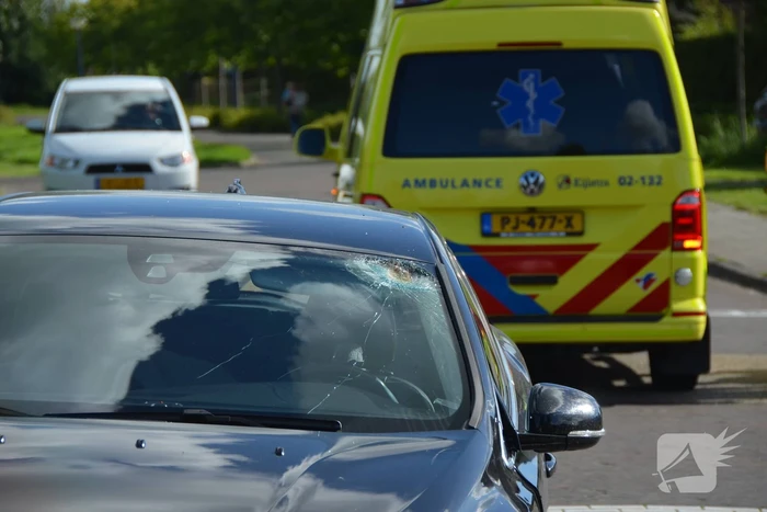 Fietsster gewond na botsing met auto