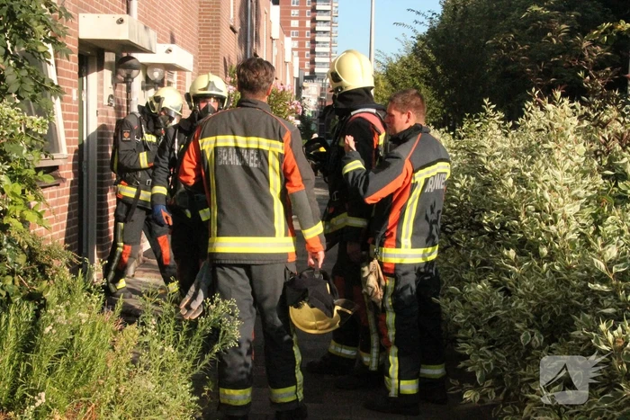 Vrouw gewond bij woningbrand